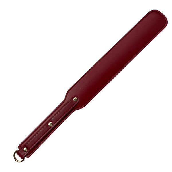 a dark red leather BDSM paddle