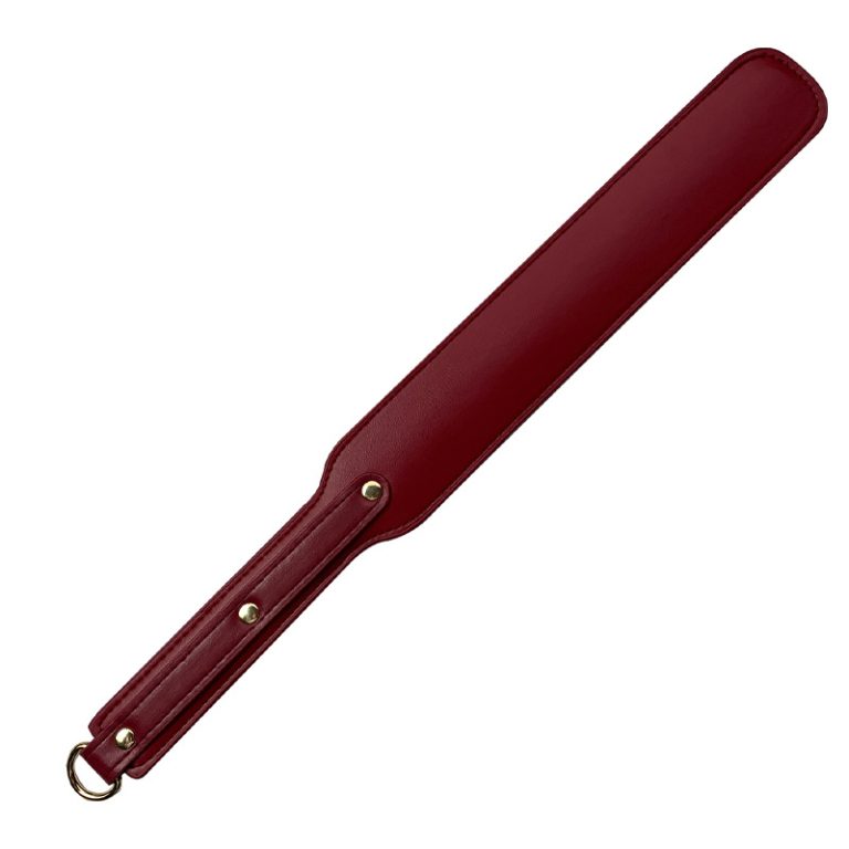 a dark red leather BDSM paddle
