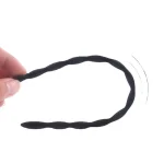 1 pieces black silicone dilator in hand