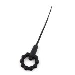 a black silicone urethral dilator