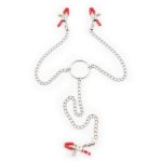 a red nipple and clitoral clamps