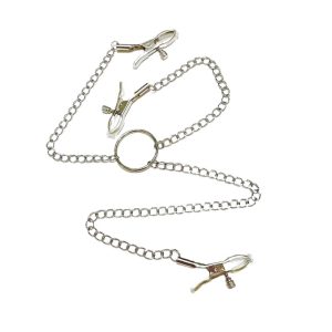 a silver nipple and clitoral clamps