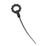 a black silicone urethral dilator