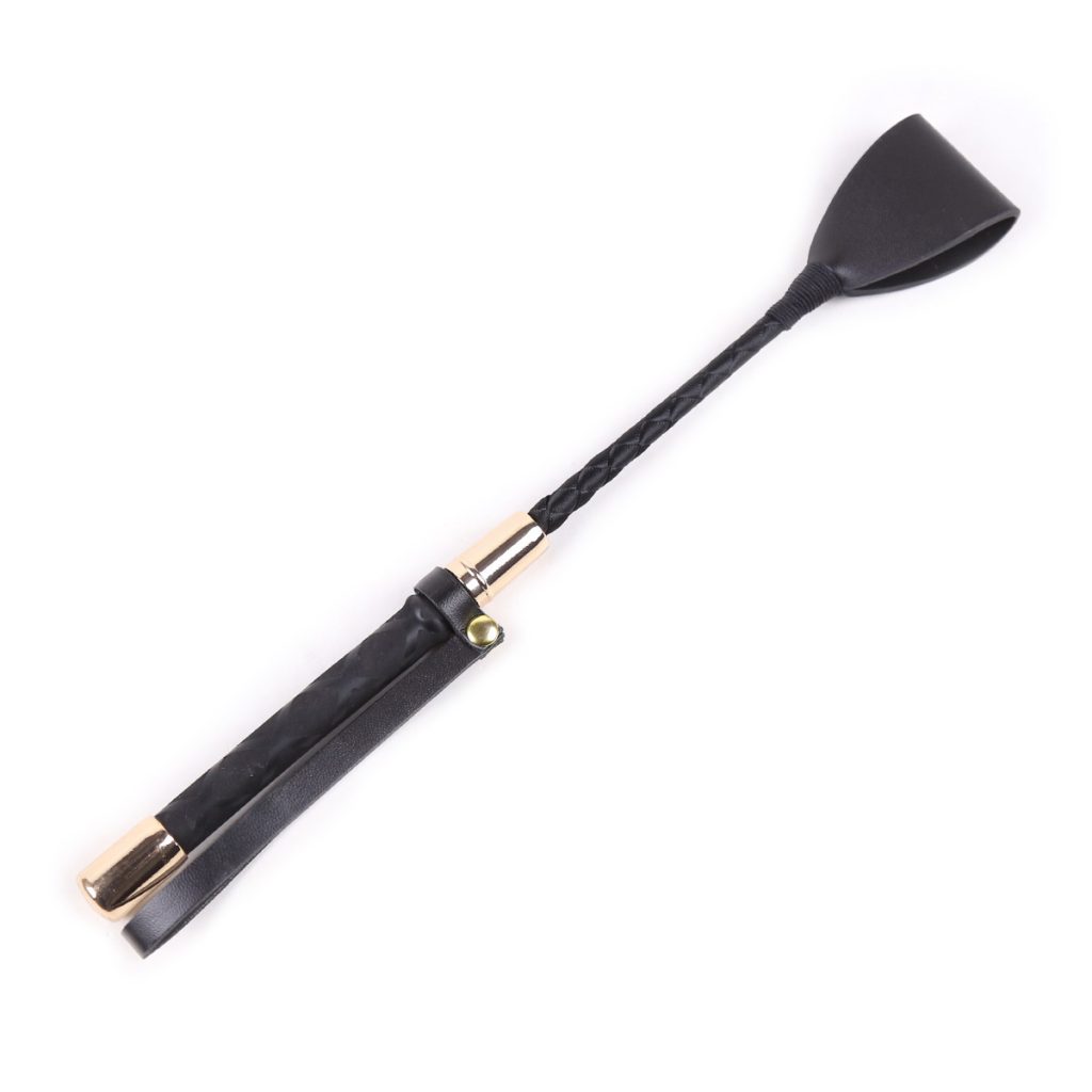a black leather riding crop